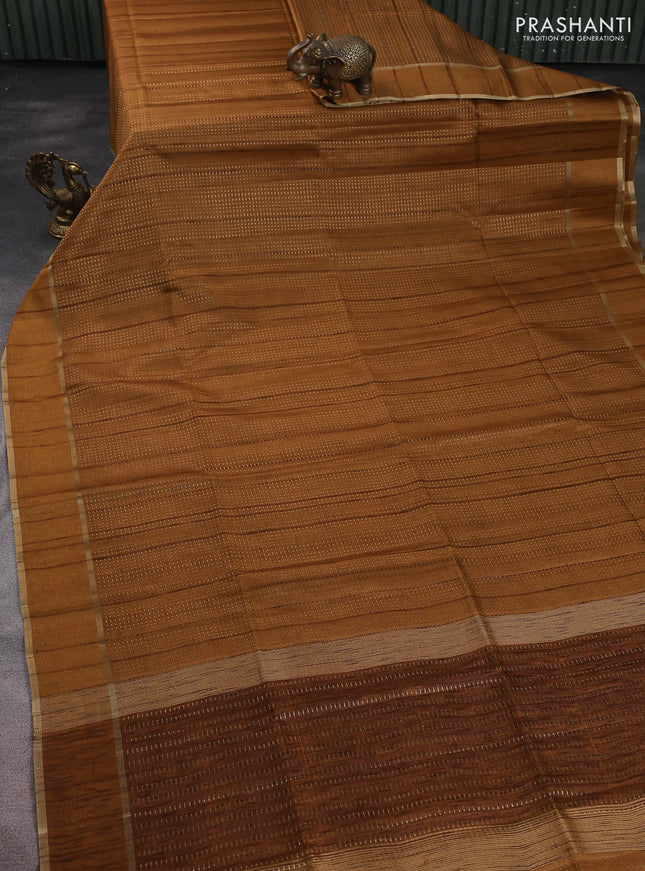 Semi matka saree dark mustard with allover zari weaves and rettapet zari woven border