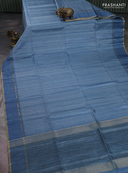 Semi matka saree pastel blue with allover zari weaves and rettapet zari woven border