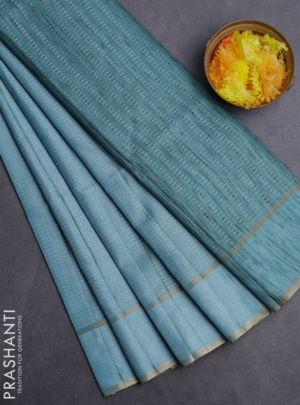 Semi matka saree light blue with allover zari weaves and rettapet zari woven border