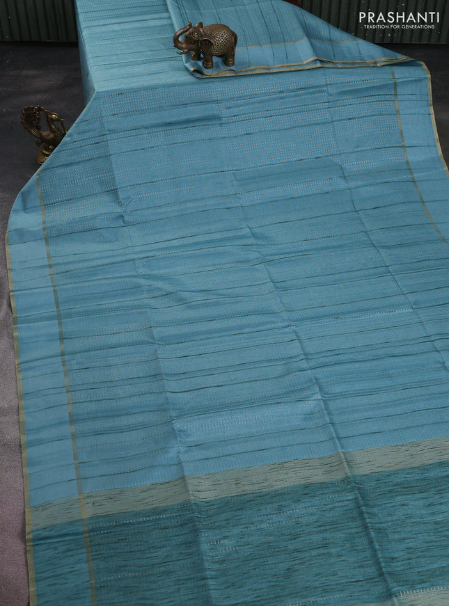 Semi matka saree light blue with allover zari weaves and rettapet zari woven border