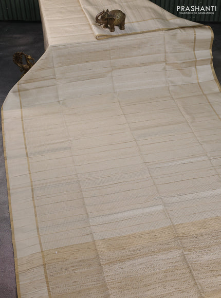 Semi matka saree off white with allover zari weaves and rettapet zari woven border