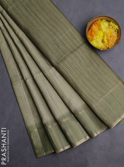 Semi matka saree pastel green with allover zari weaves and rettapet zari woven border