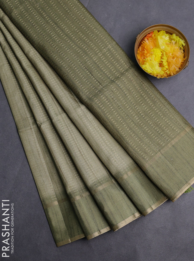 Semi matka saree pastel green with allover zari weaves and rettapet zari woven border