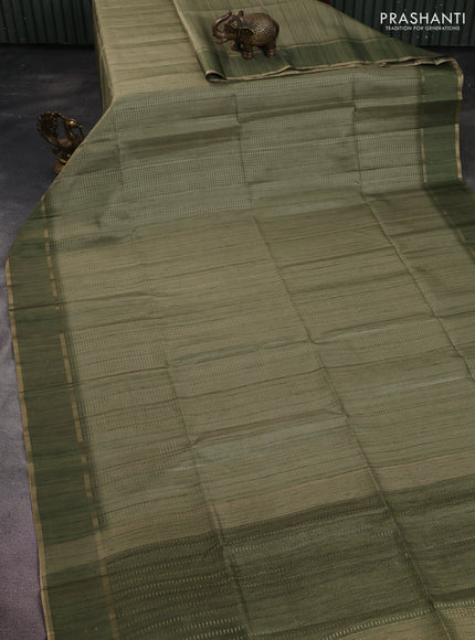 Semi matka saree pastel green with allover zari weaves and rettapet zari woven border