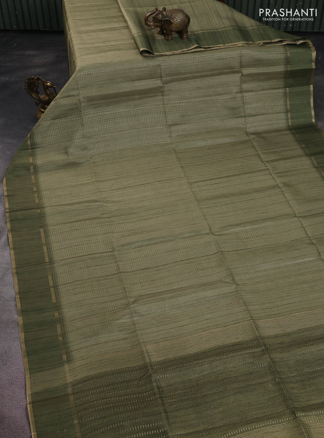 Semi matka saree pastel green with allover zari weaves and rettapet zari woven border