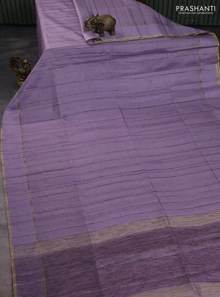 Semi matka saree pastel lavender with allover zari weaves and rettapet zari woven border