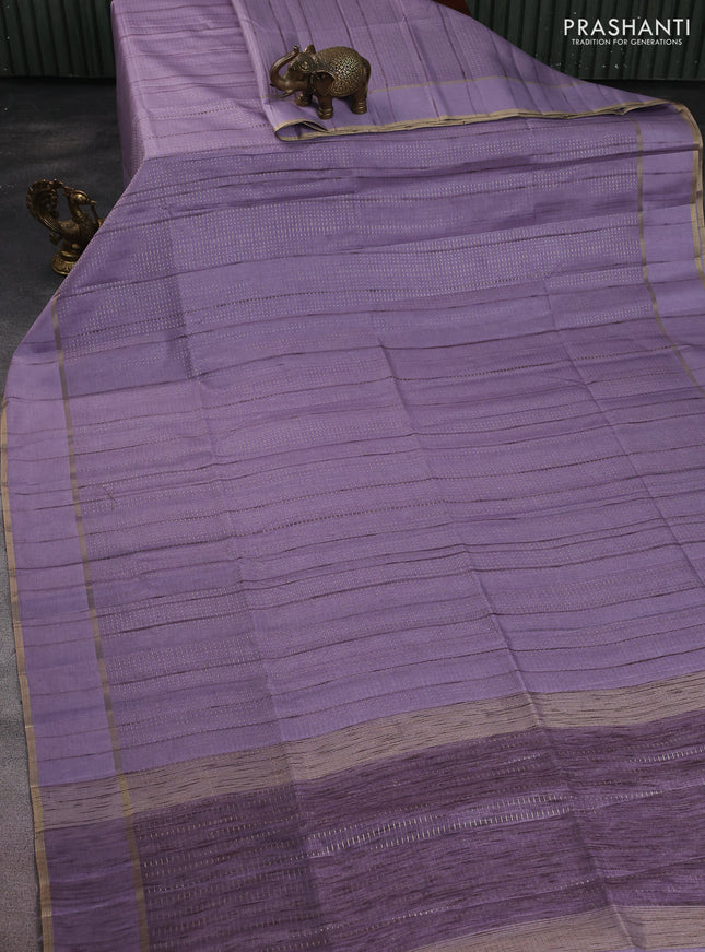 Semi matka saree pastel lavender with allover zari weaves and rettapet zari woven border