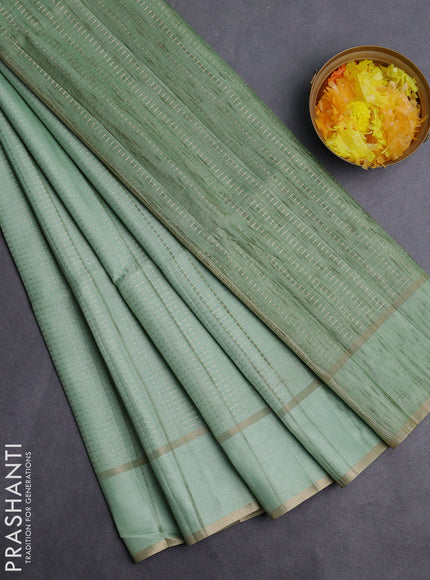 Semi matka saree pastel green with allover zari weaves and rettapet zari woven border