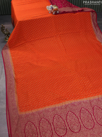 Banarasi crepe partly saree orange and pink with woven buttas and woven border