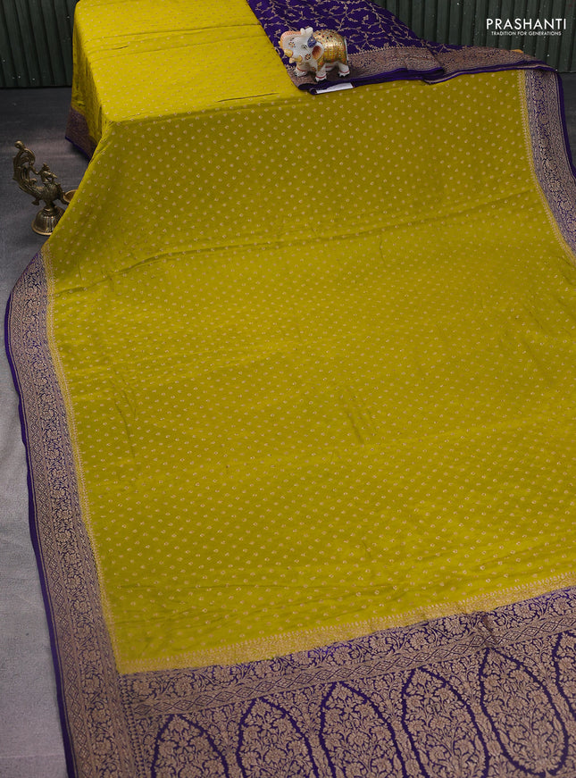 Banarasi crepe partly saree lime yellow and violet with woven buttas and woven border