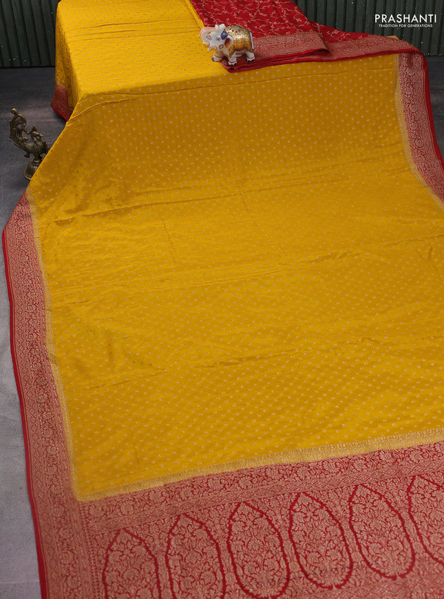 Banarasi crepe partly saree mustard yellow and maroon with woven buttas and woven border