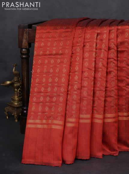 Pure dupion silk saree rustic orange with allover zari weaves and zari woven simple border