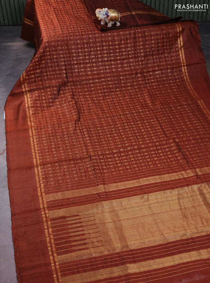 Pure dupion silk saree brown with allover zari weaves and zari woven simple border