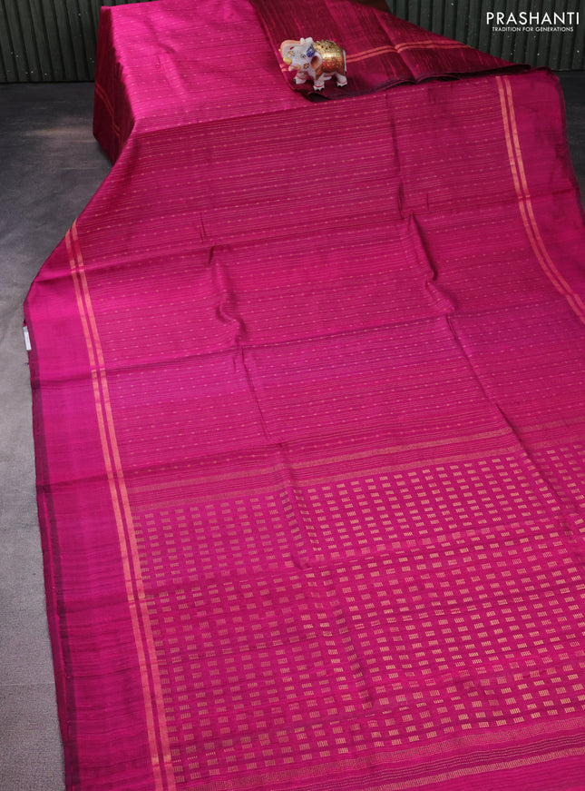 Pure dupion silk saree magenta pink with allover zari weaves and zari woven simple border