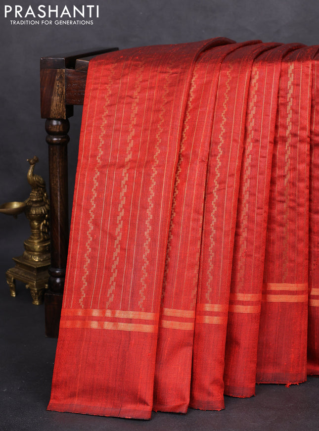 Pure dupion silk saree orange with allover zari weaves and zari woven simple border