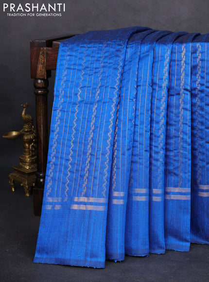 Pure dupion silk saree cs blue with allover zari weaves and zari woven simple border
