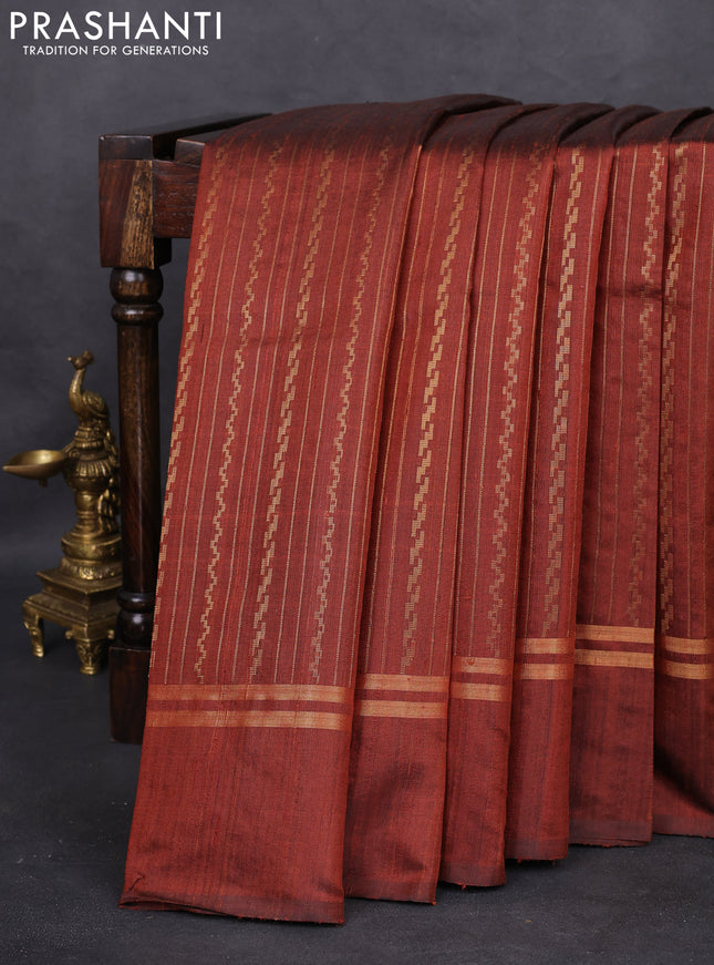 Pure dupion silk saree brown with allover zari weaves and zari woven simple border