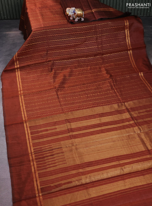 Pure dupion silk saree brown with allover zari weaves and zari woven simple border