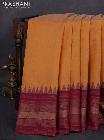 Pure dupion silk saree yellow and maroon with plain body and temple design zari woven border