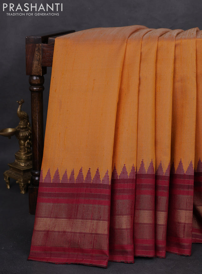 Pure dupion silk saree yellow and maroon with plain body and temple design zari woven border