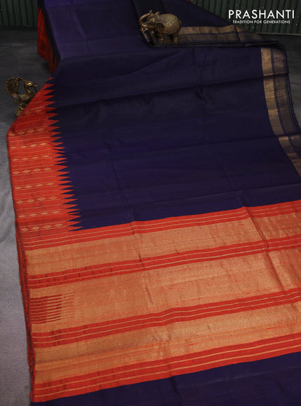 Pure dupion silk saree navy blue and rustic orange with plain body and temple design zari woven border