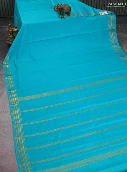 Pure mysore silk saree teal green shade with plain body and zari woven border