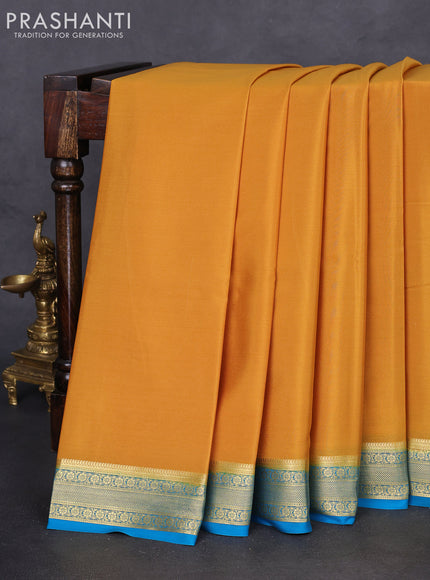 Pure mysore silk saree mustard yellow and cs blue with plain body and zari woven border