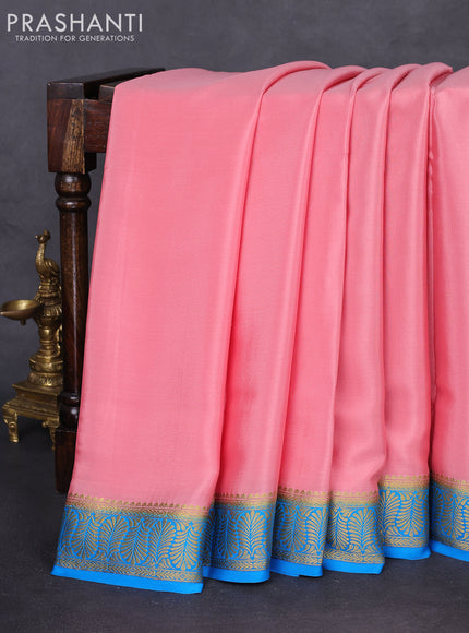 Pure mysore silk saree mild peach shade and cs blue with plain body and zari woven border