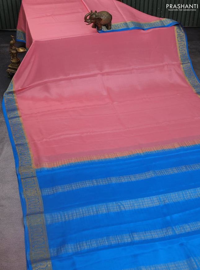 Pure mysore silk saree mild peach shade and cs blue with plain body and zari woven border