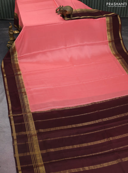 Pure mysore silk saree peach shade and coffee brown with plain body and rettapet zari woven border