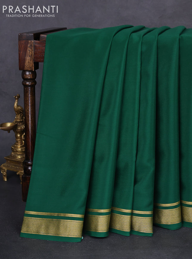 Pure mysore silk saree dark green with palin body and zari woven border