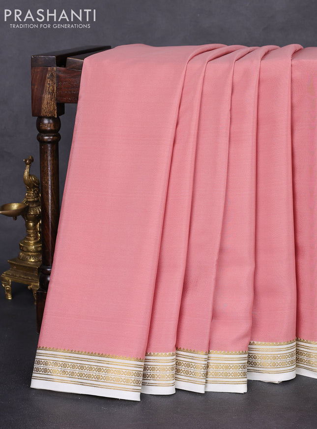 Pure mysore silk saree pastel peach and cream with palin body and zari woven border