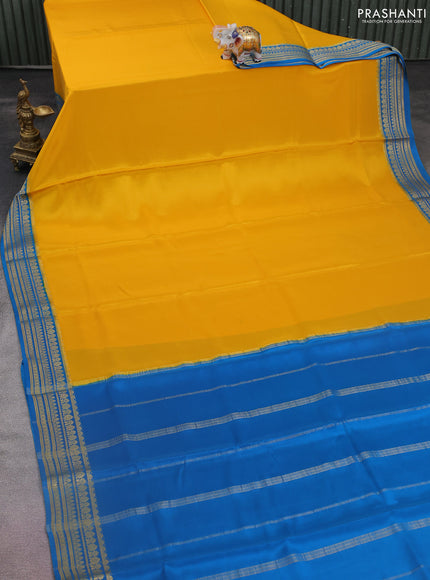 Pure mysore silk saree yellow and cs blue with palin body and zari woven border