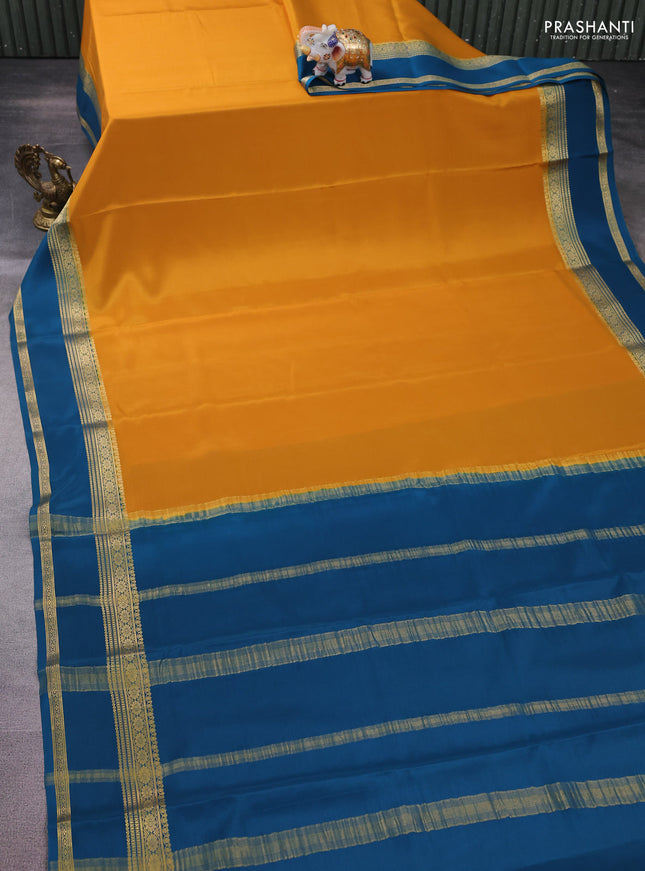 Pure mysore silk saree mustard yellow and peacock blue with plain body and rettapet zari woven border