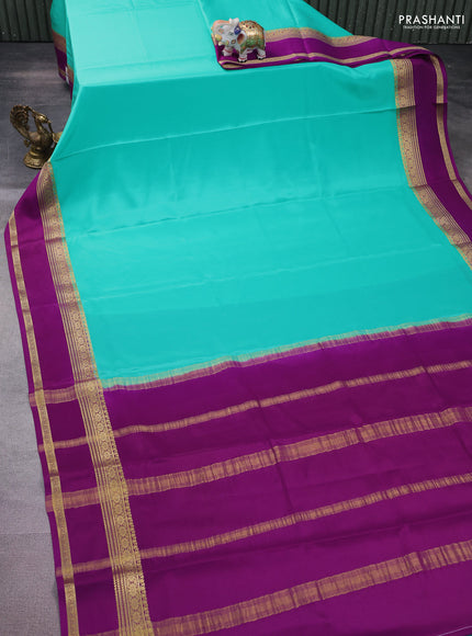 Pure mysore silk saree teal green shade and purple with plain body and rettapet zari woven border