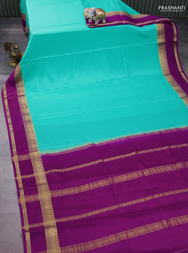 Pure mysore silk saree teal green shade and purple with plain body and rettapet zari woven border