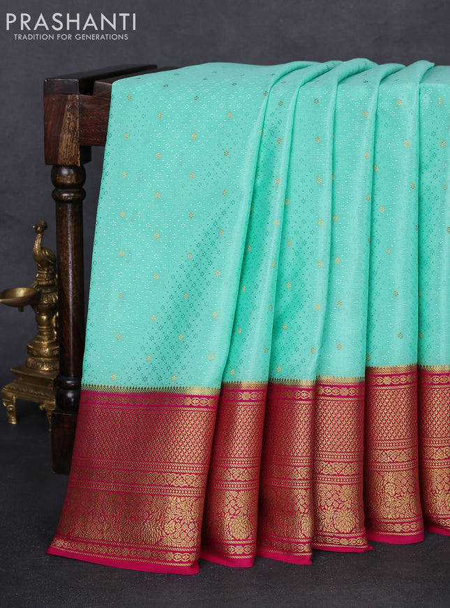 Pure mysore silk saree teal blue and pink with allover self emboss & zari buttas and long zari woven border