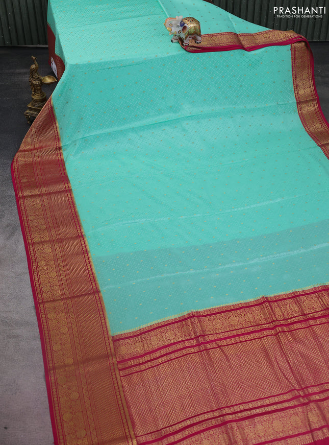 Pure mysore silk saree teal blue and pink with allover self emboss & zari buttas and long zari woven border