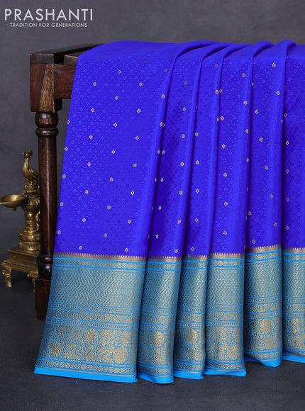 Pure mysore silk saree royal blue and cs blue with allover self emboss & zari buttas and long zari woven border