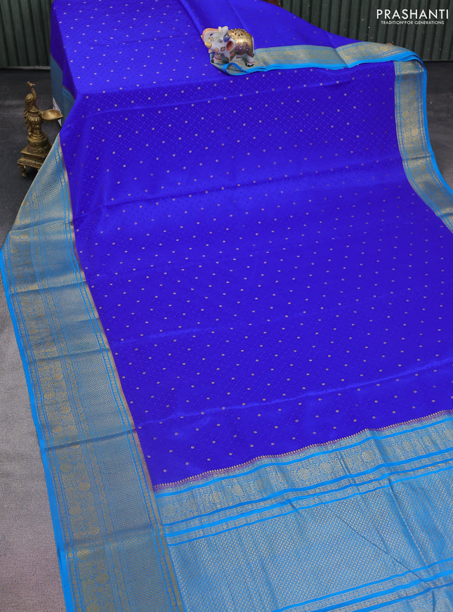 Pure mysore silk saree royal blue and cs blue with allover self emboss & zari buttas and long zari woven border