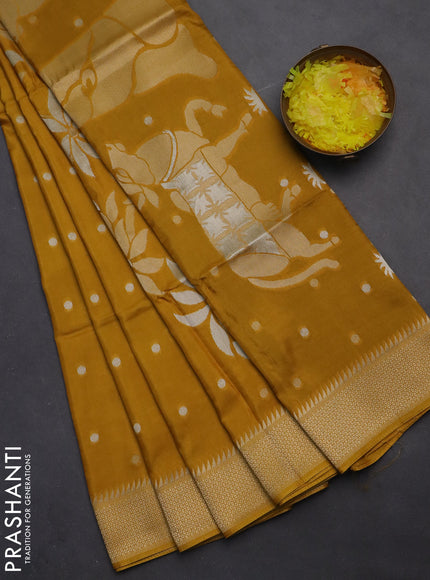Munga crepe silk saree mustard yellow and violet with zari woven buttas and rich zari woven pallu