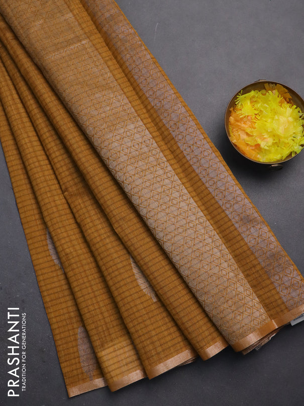 Banarasi semi matka saree dark mustard with silver & gold zari woven buttas and zari woven piping border