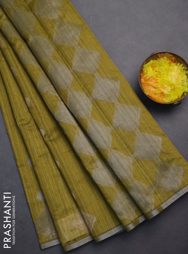 Banarasi semi matka saree mehendi green with silver & gold geometric weaves and zari woven piping border