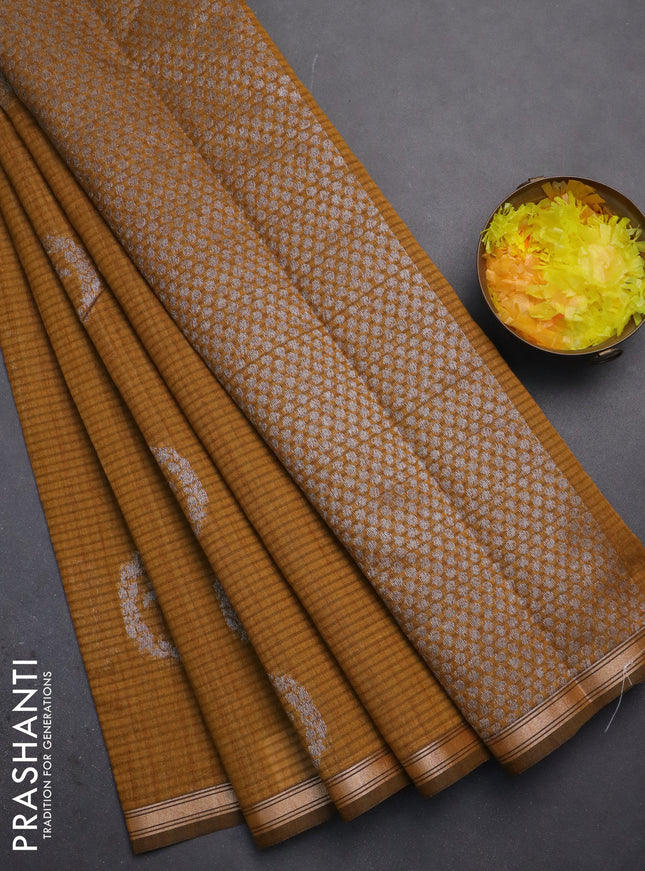 Banarasi semi matka saree dark mustard with silver & gold zari woven buttas and zari woven piping border