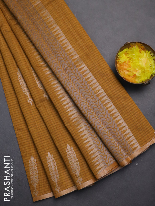 Banarasi semi matka saree dark mustard with silver & gold zari woven buttas and zari woven piping border