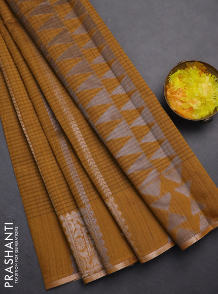 Banarasi semi matka saree dark mustard with allover silver & gold zari weaves and zari woven butta border