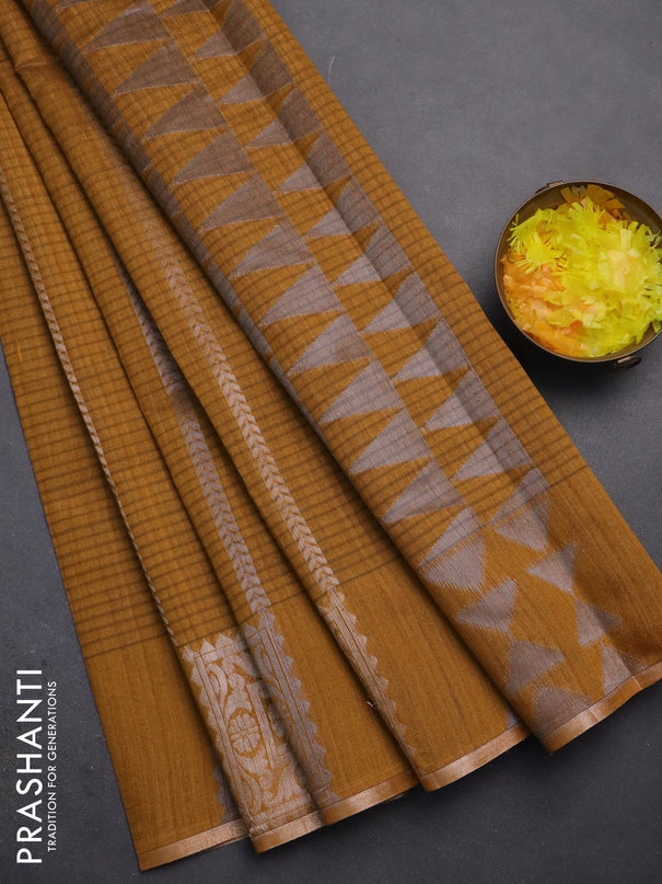 Banarasi semi matka saree dark mustard with allover silver & gold zari weaves and zari woven butta border