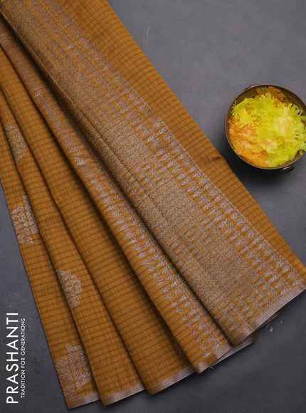 Banarasi semi matka saree dark mustard with woven buttas and zari woven piping border