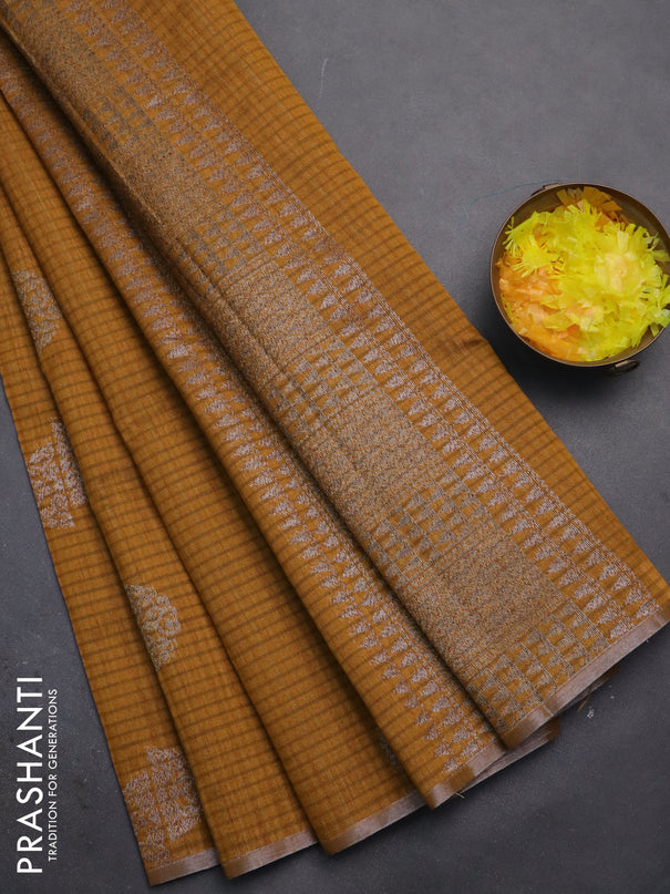 Banarasi semi matka saree dark mustard with woven buttas and zari woven piping border