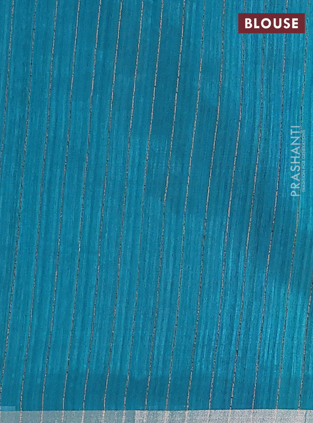 Banarasi semi matka saree teal green shade with allover zari woven geometric buttas and woven border